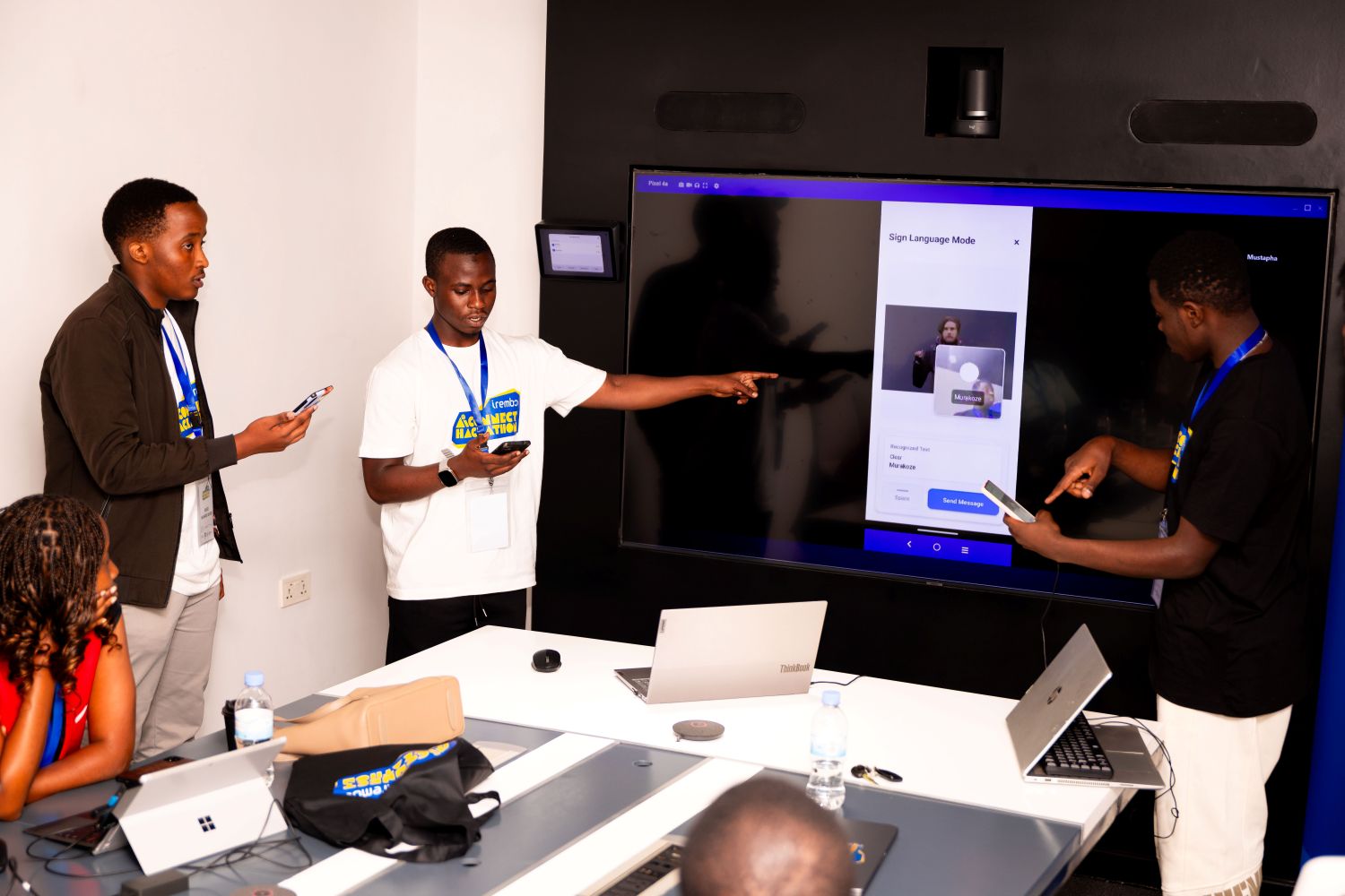 The Signal AI team presents their demo to a team esteemed judges at the Irembo Campus in Nyarutarama.