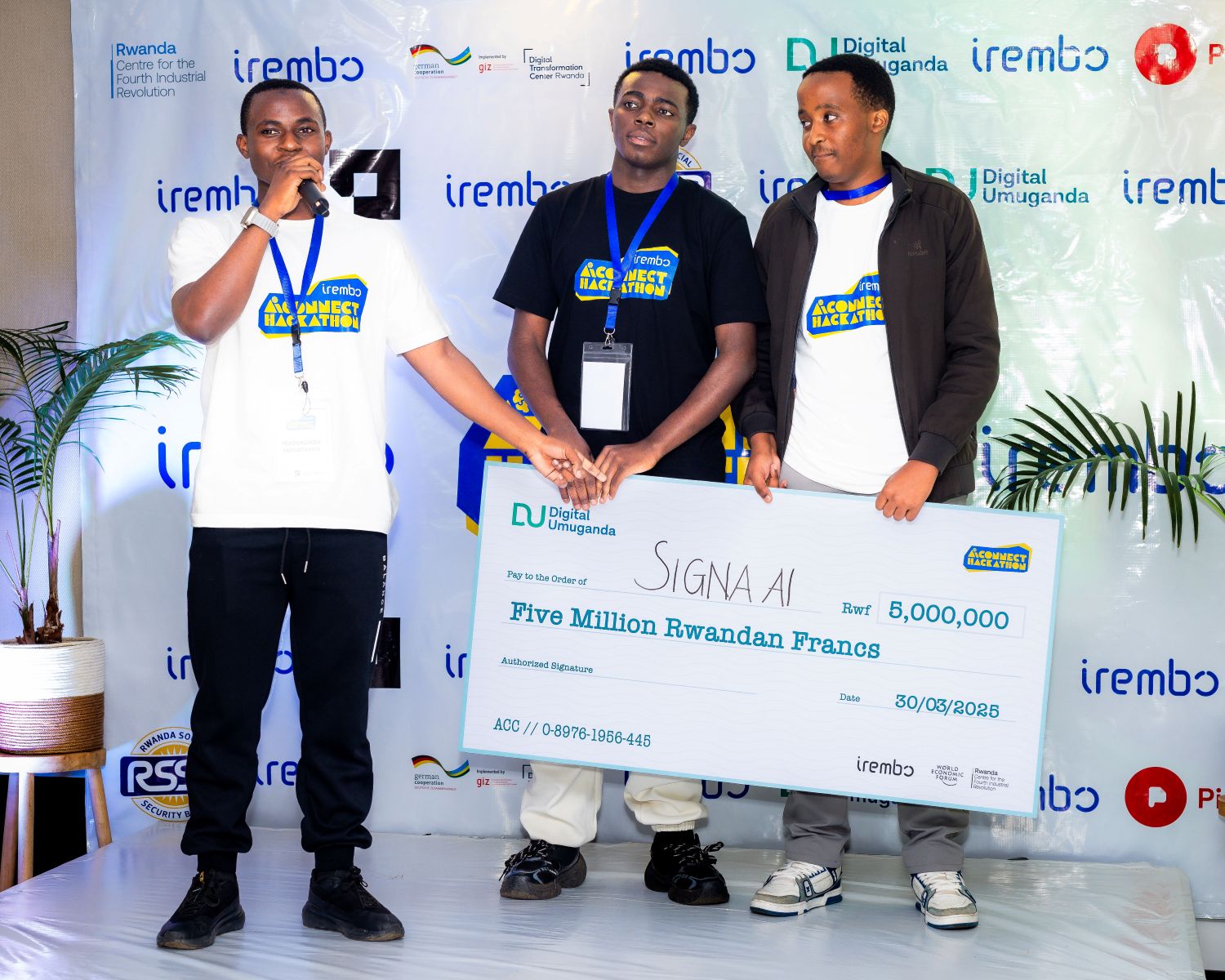 From left: Iradukunda Moustapha, 19, Kalisa Ineza Giovanni, 18, and Bisizi Muhire Ighor, 19, during the awarding ceremony.
