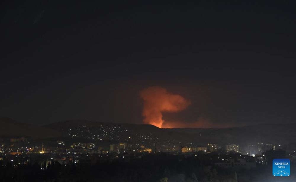 Israeli warplanes launched multiple airstrikes late Sunday, targeting former military arsenals across Syria, according to a war monitor.