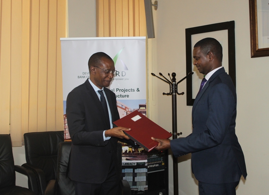 Development Bank of Rwanda (BRD) and Banque de Développement des Etats des Grands Lacs (BDEGL) Officials signing the agreement