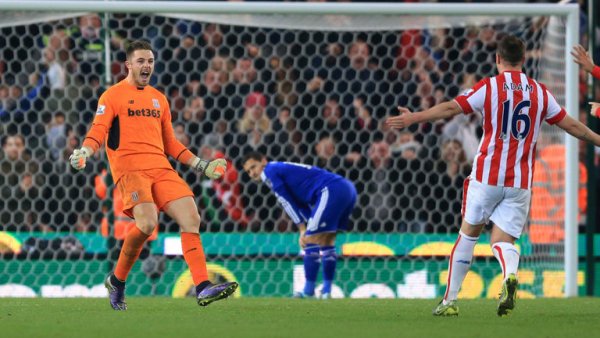 Jack Butland (left) celebrates after saving Hazard's penalty