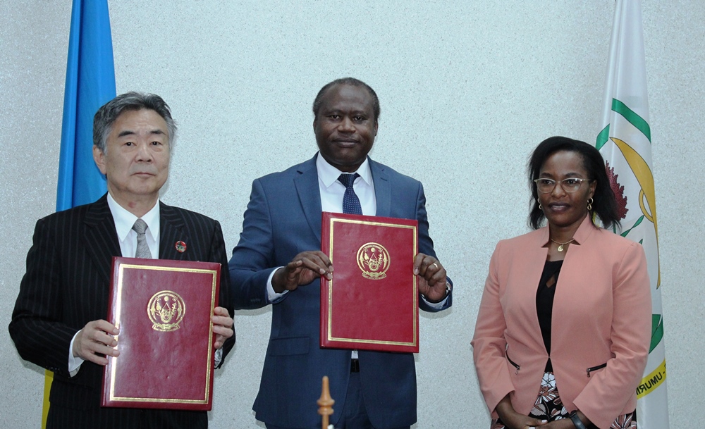 Left-right: The Ambassador of Japan to Rwanda, Imai Masahiro; Dr. Uzziel Ndagijimana, Rwanda's Minister of Finance Economic Planning and Isabelle Kalihangabo, the Deputy Secretary General of Rwanda Investigative Bureau after the signing ceremony.  