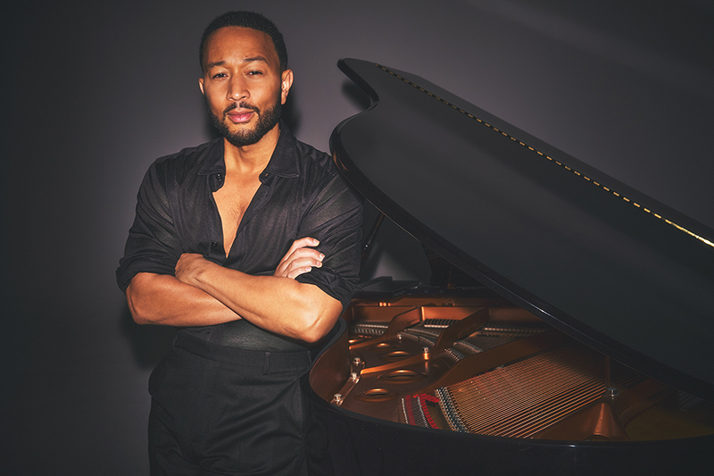 John Legend is known for a collection of hits that span various genres, blending soul, R&B, pop, and more. 