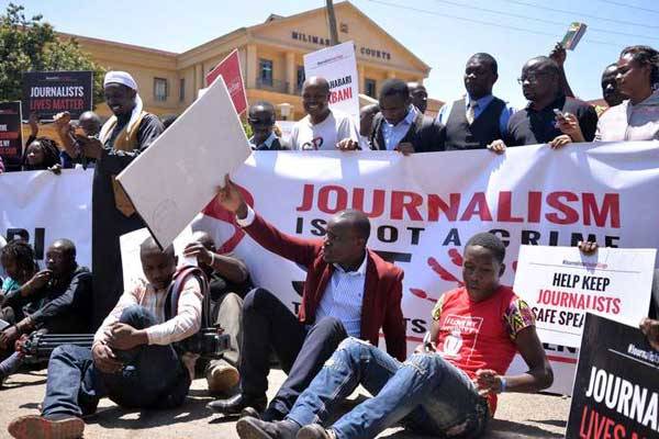 Journalists and civil rights activists hold protests in Nairobi on September 8, 2016 over harassment and killings of journalists.
