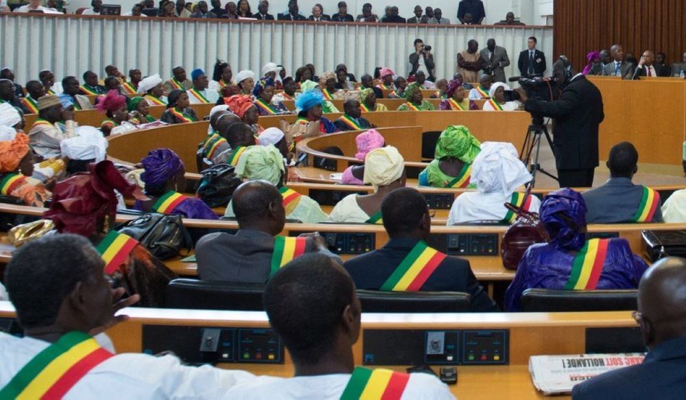 Senegal's parliament on Monday adopted a bill postponing the presidential election until Dec. 15 this year.