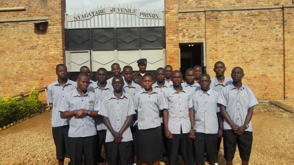 Juveniles pose for a photo as they depart to examination center