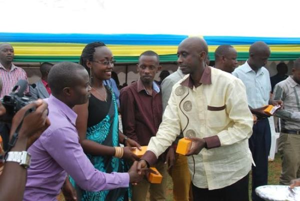 Minister Kaboneka hands over phone donations to cell executive secretaries