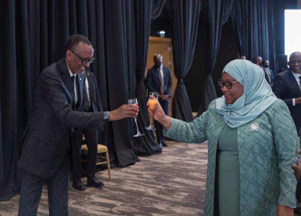 President Paul Kagame joining her counterpart of Tanzania for a toast.