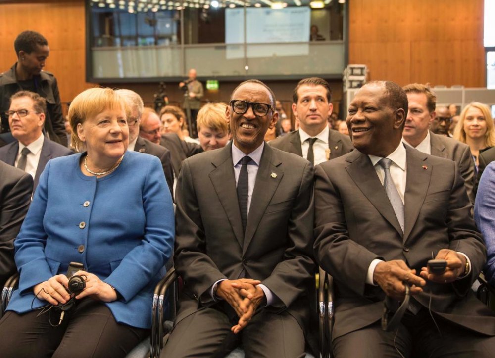 L-R:German Chancellor, Angela Merkel, President Kagame, and the Ivory coast President, Alassane Dramane Ouattara attending the G20 Compact with Africa Investment Summit in 2019.