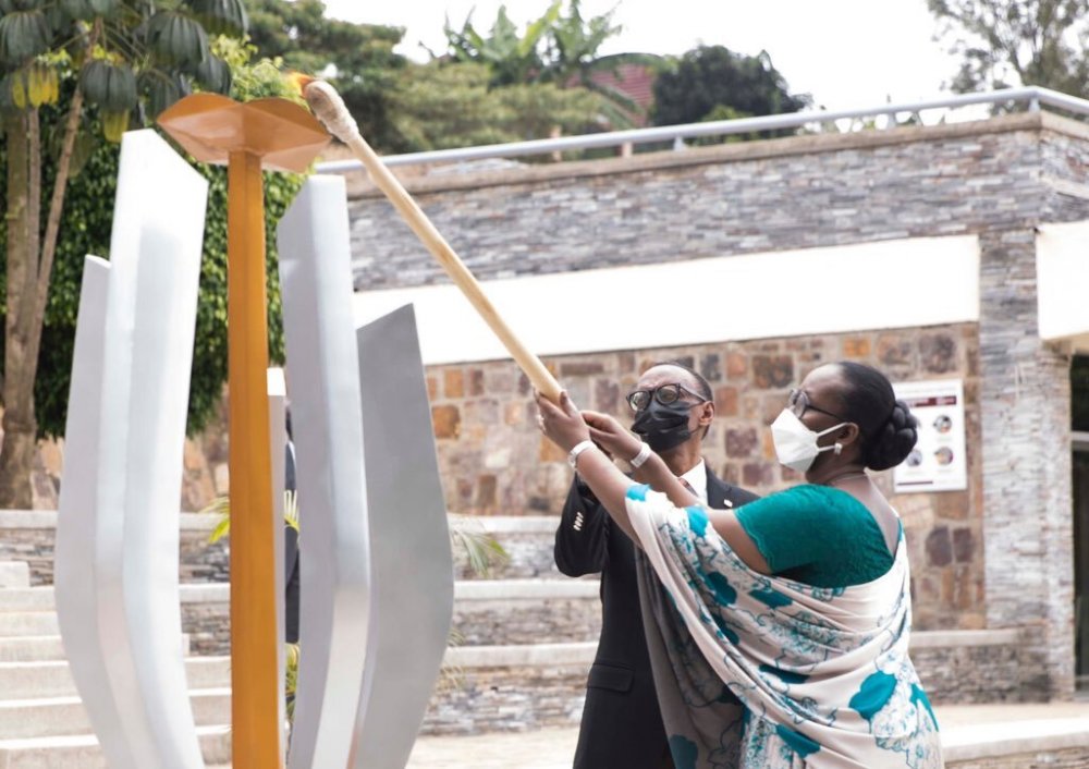 President Paul Kagame and First Lady Jeannette Kagame lighting the flame of hope at Kigali Genocide Memorial. Photo Courtesy