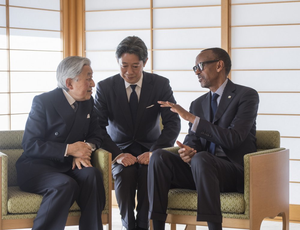 President talkimg with Japan's Emperor Akihito