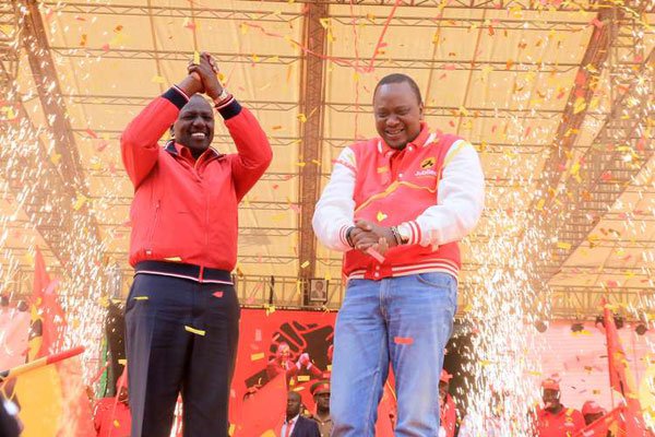 President Uhuru Kenyatta (right) and Deputy President William Ruto at the launch of Jubilee Party at Safaricom Stadium Kasarani in Nairobi on September 10, 2016.