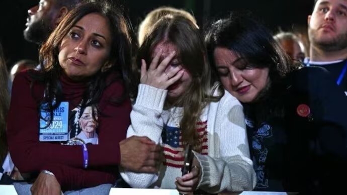 Supporters react to election results during an election night event for US Vice President and Democratic presidential candidate Kamala Harris at Howard University in Washington, November 5, 2024.