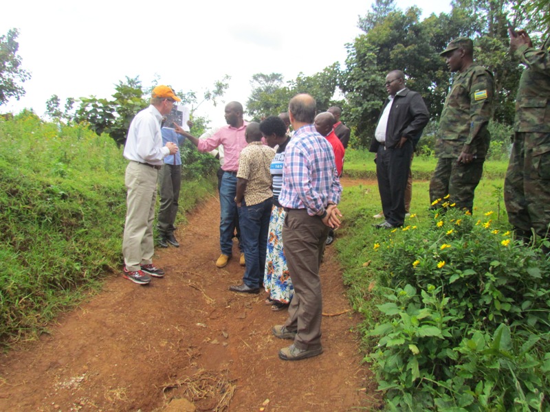 The staff of University of Global Health Equity and Rwanda's officials inspecting the ground where the university will be built