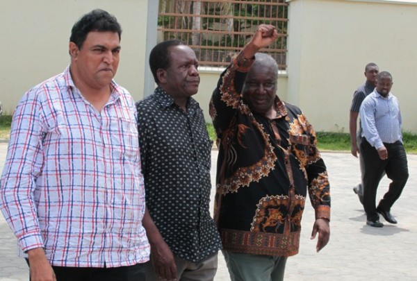 THE three MPs appeared before the Kisutu Resident Magistrate’s Court in Dar es Salaam yesterday charged with bribery walk towards the courtroom. They are from left; Suleiman Sadiq Murad (Mvomero), Victor Mwambalaswa (Lupa) and Kangi Lugola (Mwibara). (Photo by Mohamed Mambo)