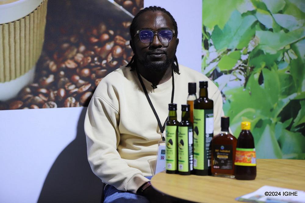 Niyondorera Gerishom, showcasing his premium honey and avocado and banana wine oil. He expressed his aspiration to highlight not only Rwanda’s tourism and services but also its diverse array of promising products.