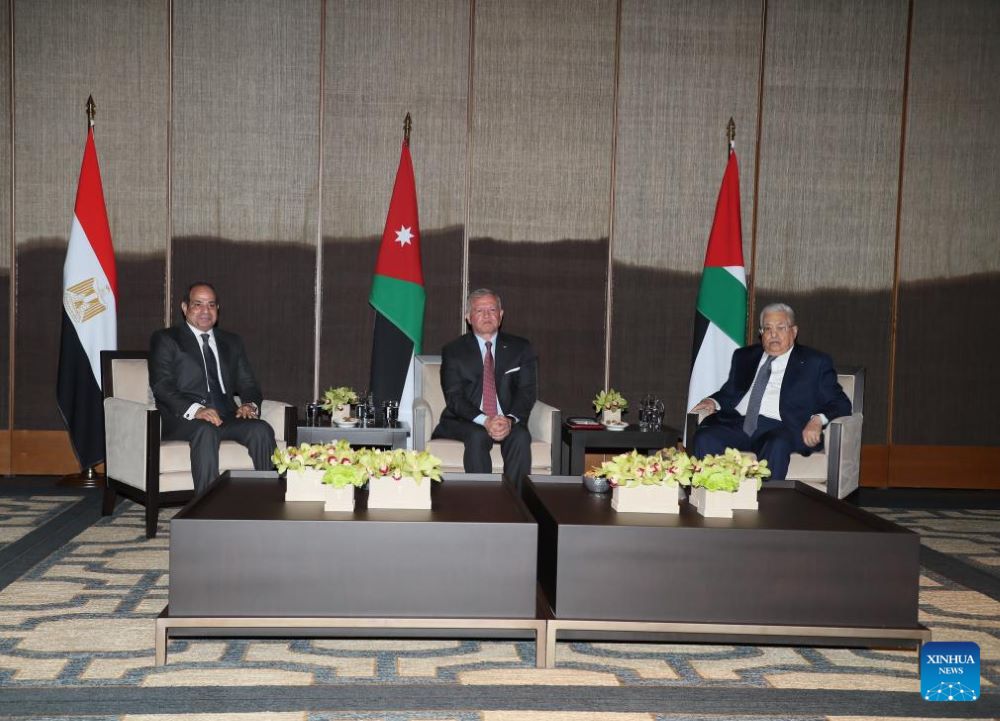 King Abdullah II (C) of Jordan, Egyptian President Abdel-Fattah al-Sisi (L) and Palestinian President Mahmoud Abbas attend a trilateral summit in Aqaba, Jordan, on Jan. 10, 2024. Jordan, Egypt and Palestine stressed Wednesday their rejection of any Israeli plans to displace Palestinians in the West Bank and the Gaza Strip. (Royal Hashemite Court/Handout via Xinhua)