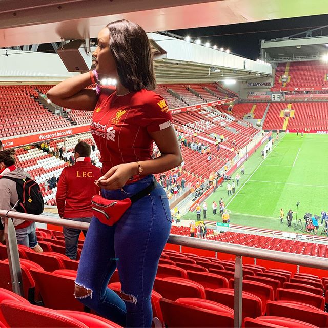 Kate Bashabe visiting Anfield, the iconic home of Liverpool FC.