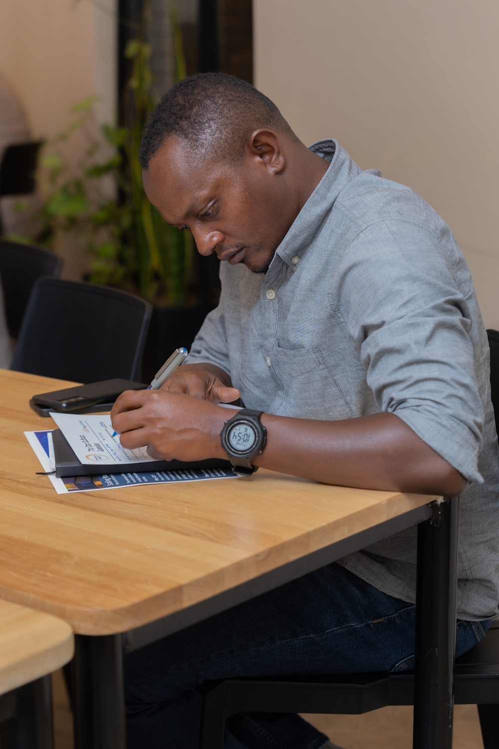 Jean de Dieu Kayitare, the owner of Q Limited company that sells electronic devices.