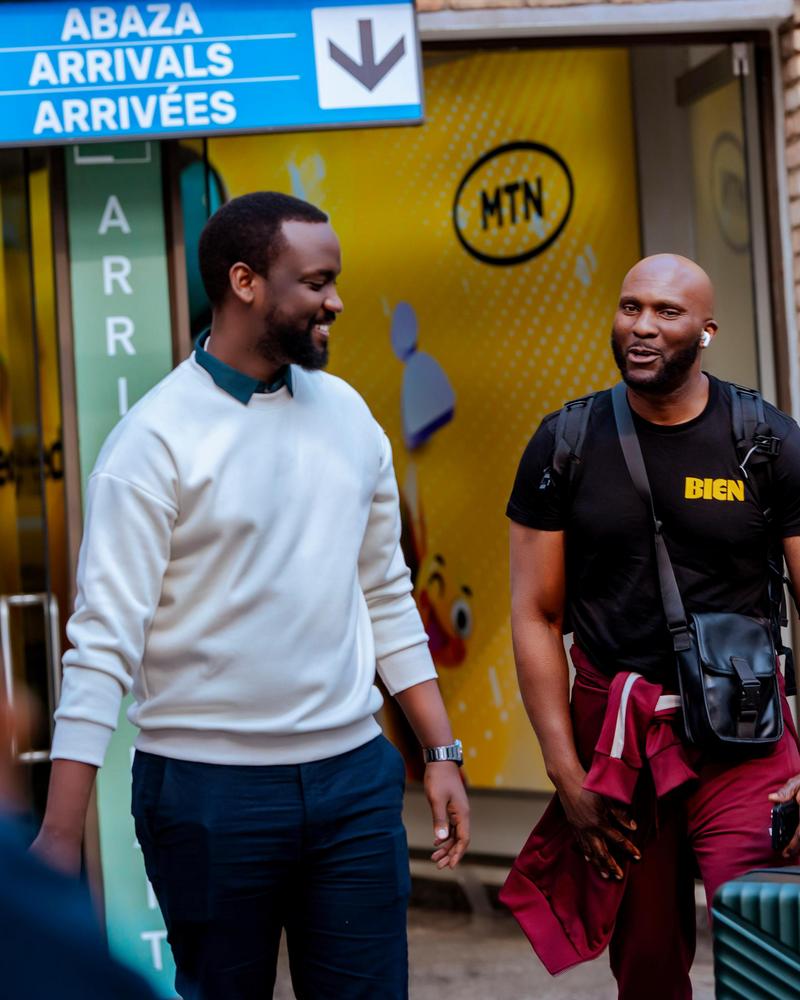Kenny Mugarura, CEO of 1:55 AM Ltd, warmly welcomed Adesope Olajide upon his arrival in Kigali.