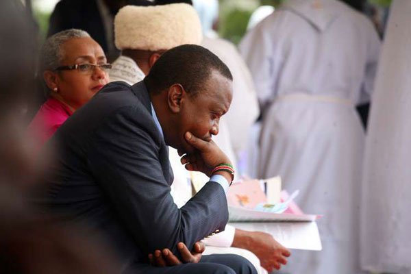 President Uhuru Kenyatta deep in thought at Apostles of Jesus Shrine Christ the King in Karen, Nairobi on November 22, 2015.