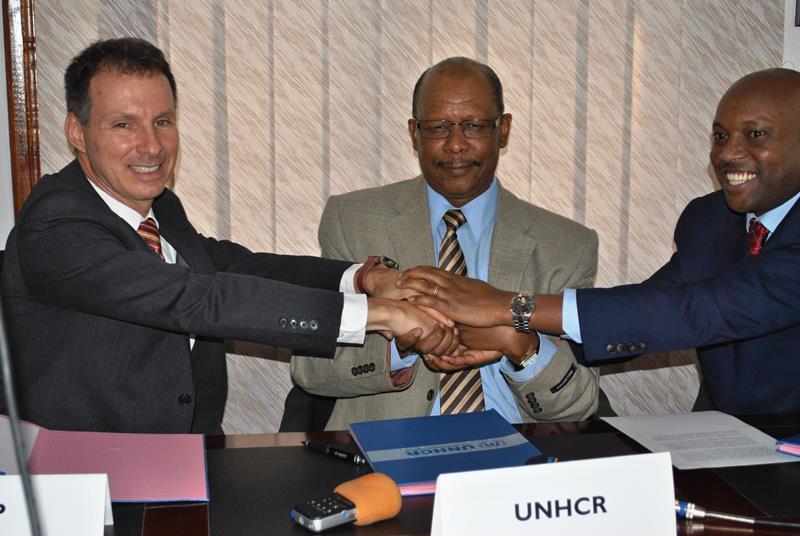 The representatives of UN Refugee Agency (UNHCR) with the World Food Programme (WFP) and Equity Bank Rwanda after signing the agreement