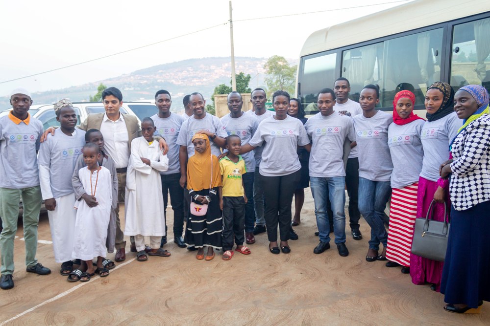 Kigali Marriott Hotel staff pose for a photo as they wait for iftar time at Mar’wa Rah’Man Mosque in Rwarutabura, Nyamirambo