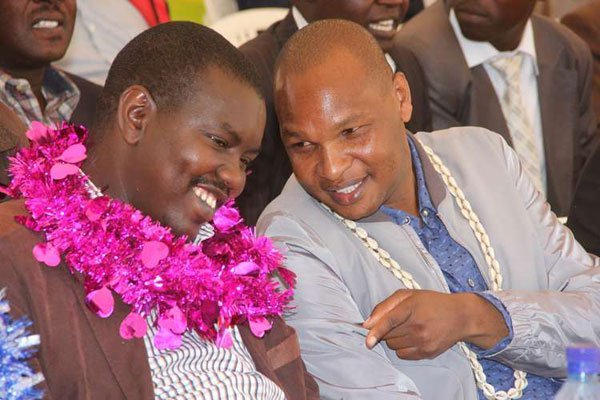 Deputy President William Ruto's top aide, Mr Farouk Kibet (right), with Uasin Gishu Governor Jackson Mandago at a past event. Mr Kibet received Sh1.5 million from Josephine Kabura Irungu, the woman named as a key suspect in the looting of the National Youth Service.