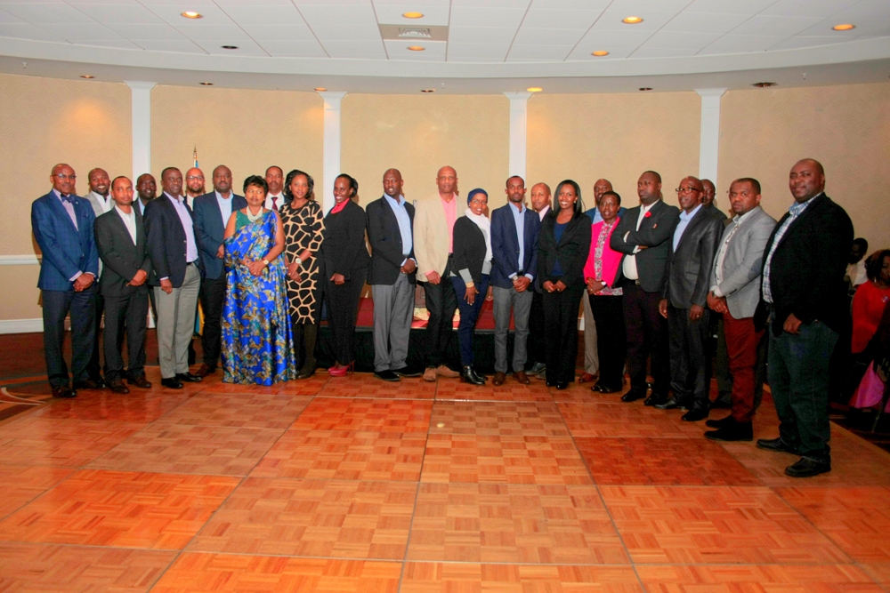 Embassy Staff and Rwandan Community leaders from across the US pose with the Ambassador