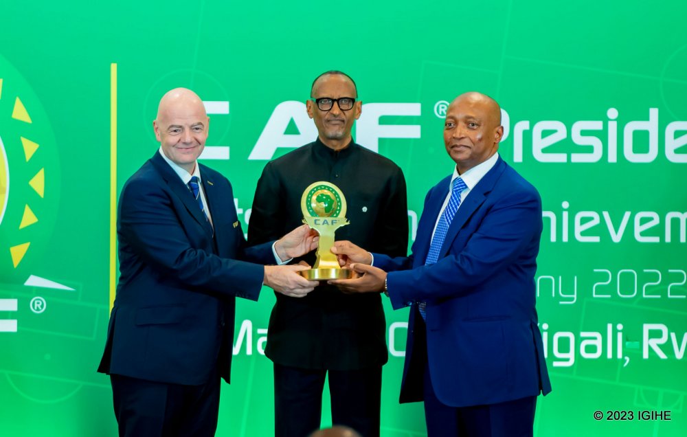 President Kagame receiving the award from FIFA President, Gianni Infantino and CAF President, Patrice Motsepe.