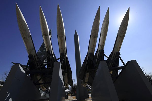 Replicas of a North Korean Scud-B missile (centre) and South Korean Hawk surface-to-air missiles are displayed at the Korean War Memorial in Seoul on March 6, 2017. Japan, South Korea and the US have joined forces to counter any attack from Pyongyang.