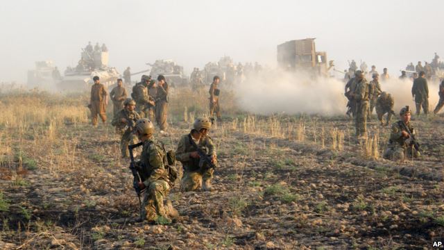 Kurdish troops known as peshmerga deploy during a military operation to regain control of some villages from Islamic State group fighters south of oil-rich city of Kirkuk, 180 miles (290 kilometers) north of Baghdad, Iraq.