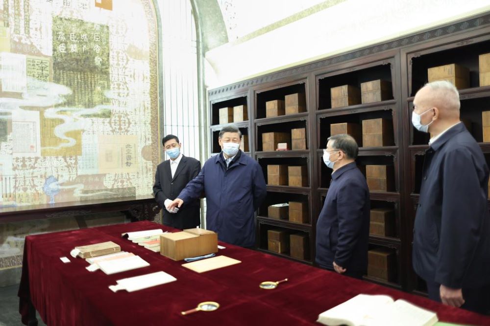 Xi Jinping visits an exhibition hall of the China National Archives of Publications and Culture, and learns about the preservation of classic publications in its collection in Beijing, capital of China, June 1, 2023. (Xinhua/Ju Peng)