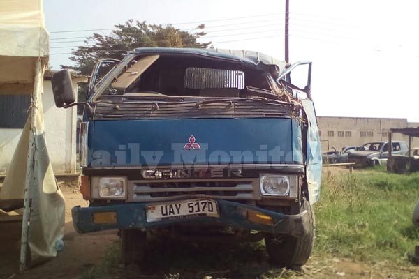 The wreckage of the car which crashed, killing three people and injuring 30 others parked at Mbarara Regional Police station.