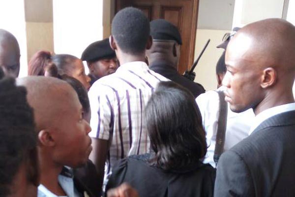 Journalists stranded outside the judge's chambers after they were blocked.
