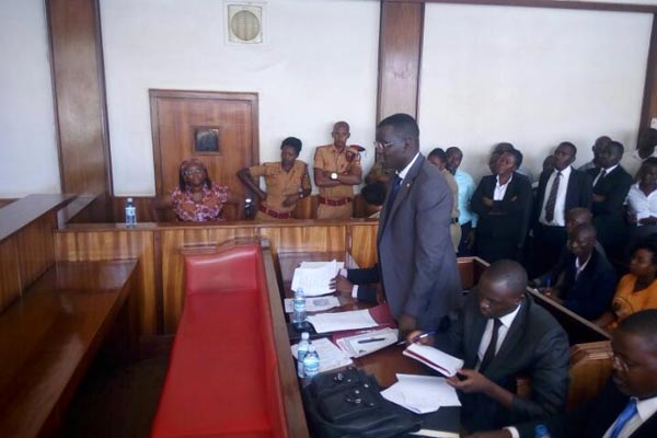 Lawyer Nicholas Opiyo makes case for his client Dr Stella Nyanzi (in the dock) at Buganda Road Magistrate's court on Monday, April 10, 2017.
