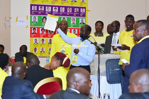 Mr Tanga Odoi leads in the counting of the ballots shortly before chaos stopped the process.
