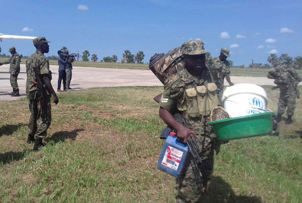 A contingent of troops after landing in Gulu