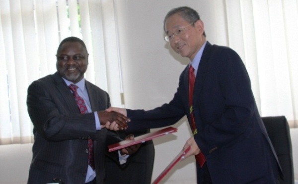 THE Permanent Secretary in the Ministry of Finance and Planning, Dr Servacius Likwelile, exchanges documents with the Ambassador of Japan to Tanzania, Mr Masaharu Yoshida, for the disbursement of 116.4 billion/- in Dar es Salaam. (Photo by Eliuteri Mangi-MAELEZO)