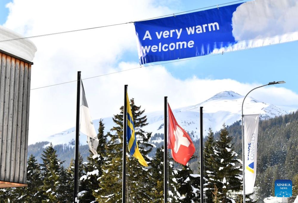 This photo taken on Jan. 15, 2024 shows a welcoming banner outside the Congress Center for the World Economic Forum (WEF) Annual Meeting 2024 in Davos, Switzerland. The WEF Annual Meeting 2024 opened here on Monday. In the face of escalating global division and uncertainty, the 54th WEF Annual Meeting has assembled leaders from around the world for a week of dialogue aimed at enhancing cooperation and cultivating partnerships. (Xinhua/Lian Yi)