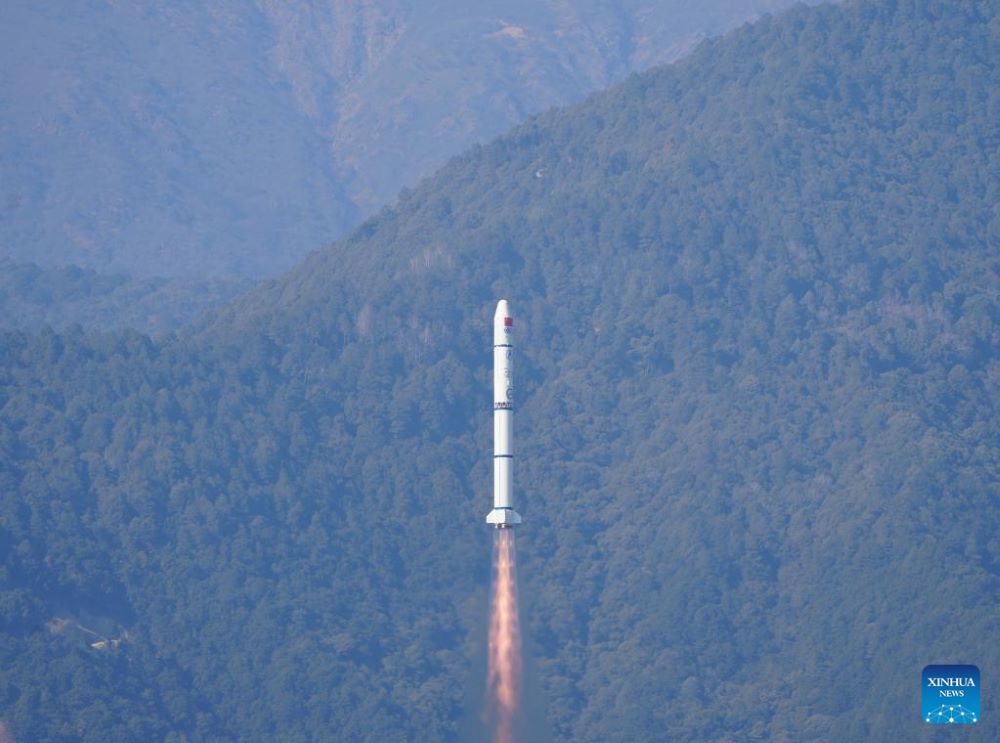 A Long March-2C carrier rocket carrying a new astronomical satellite named Einstein Probe (EP) blasts off from the Xichang Satellite Launch Center in southwest China's Sichuan Province, Jan. 9, 2024. China sent the satellite, which uses a new X-ray detection technology inspired by the lobster eye, into space on Tuesday to observe mysterious transient phenomena in the universe comparable to the flickering of fireworks, with the aim of unveiling the violent and little-known aspects of the cosmos.  The rocket was launched at 3:03 p.m. (Beijing Time) from here. (Photo by Zhang Jing/Xinhua)