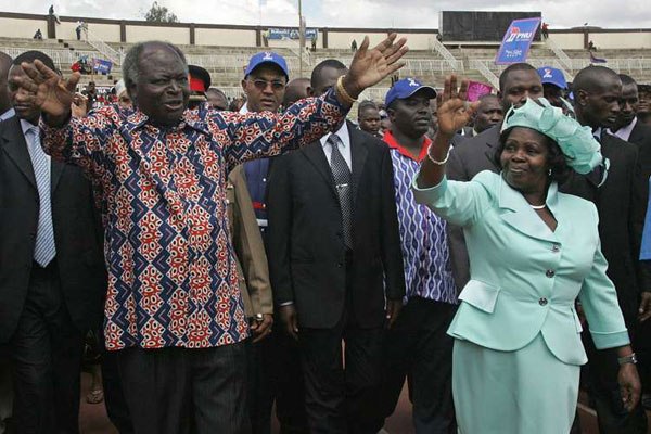 President Mwai Kibaki and his late wife Lucy Kibaki wave to supporters in Nairobi on November 15, 2007. The former First Lady died on April 26, 2016 while being treated at the Bupa Cromwell Hospital in South West London.