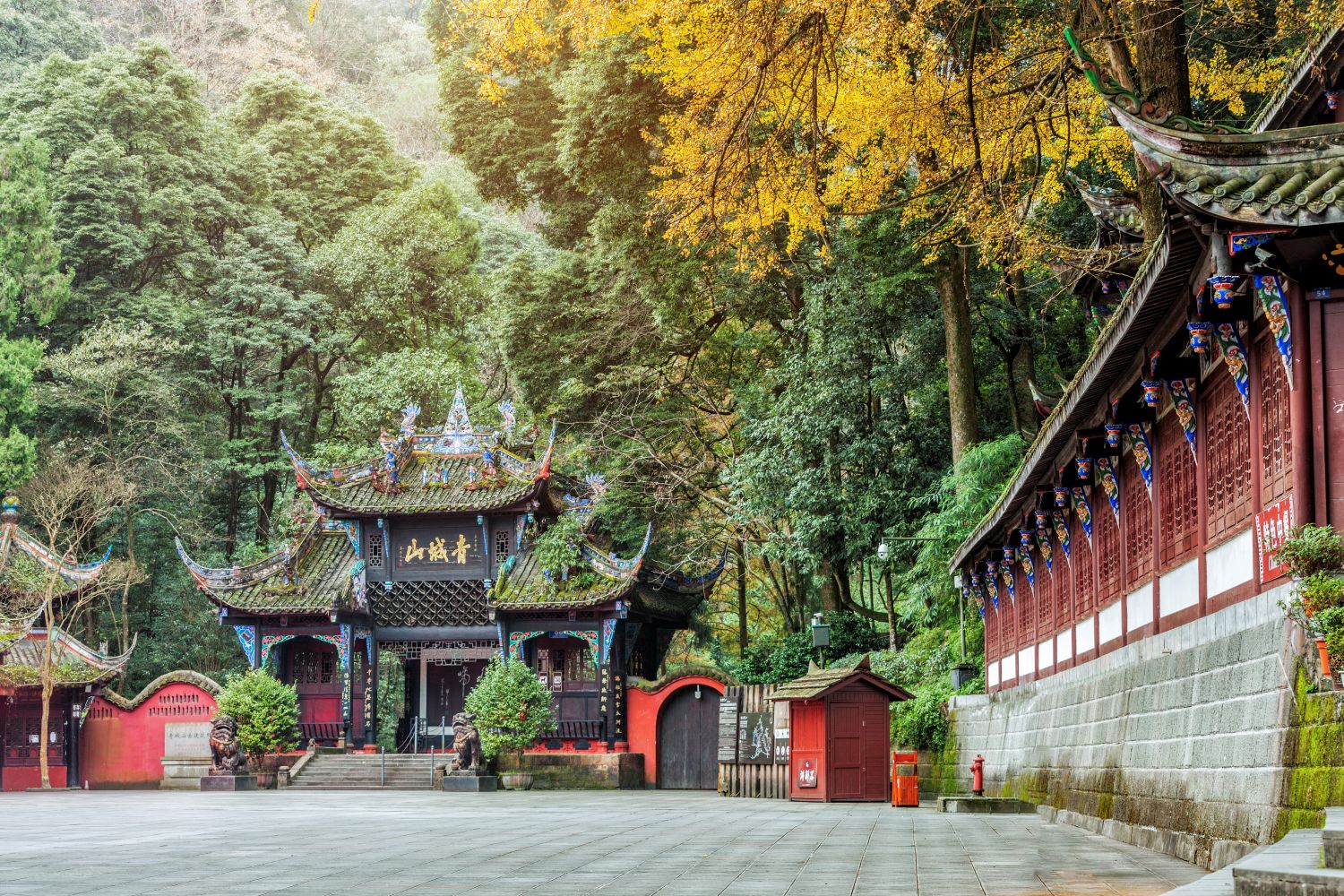 Lush greenery and clear skies welcome visitors at the entrance to Dujiangyan.