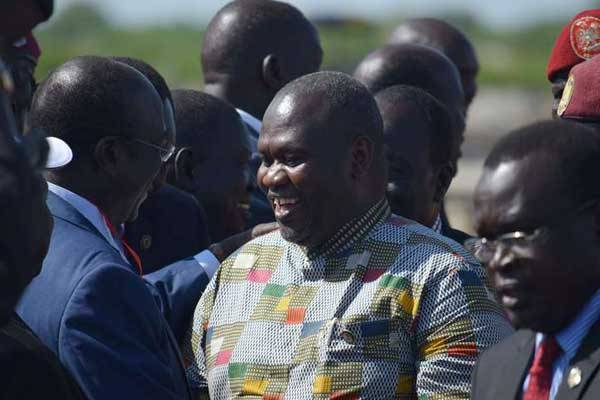 South Sudan rebel leader Riek Machar (centre) meets with his supporters after landing at Juba International Airport on April 26, 2016. Chaos resumed in July with fresh fighting in the capital Juba that forced Machar to flee.