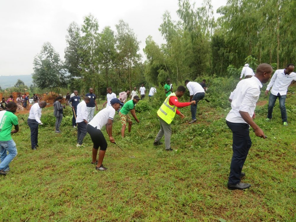 Staff from Bank of Africa together with residents from Mageragere in Umuganda