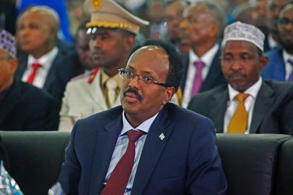 Somalia's new President Mohamed Abdullahi Mohamed looks on during its inauguration at the Mogadishu airport on February 22, 2017.