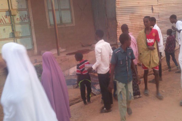 Crowd at the scene where a school watchman was killed by stray bullets in Mandera Town when police attached to Mandera Governor Ali Roba clashed with Al-Shabaab gunmen on an unknown mission.