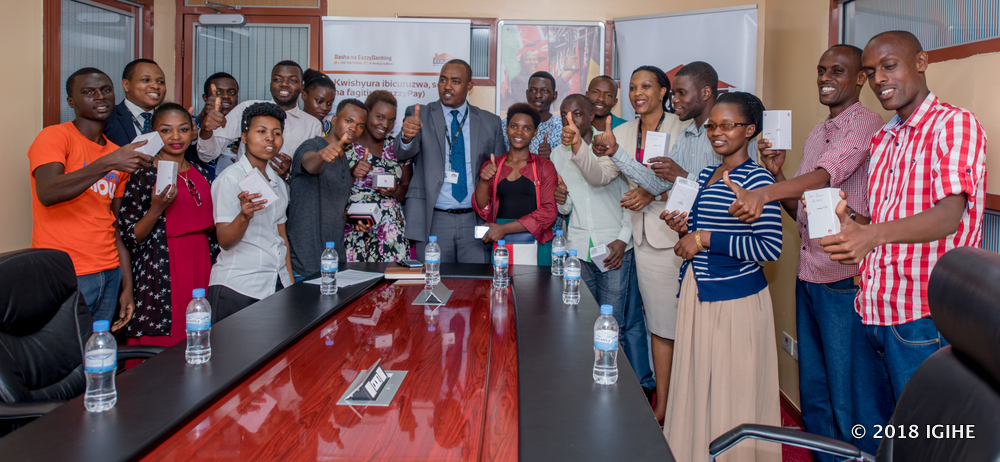The Smartphone Winners posing a group photo with Equity Bank's officials after the Prize giving function