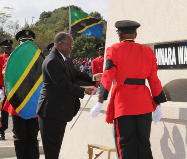 Chief of the Armed Forces, President John Magufuli, lays a sword at the Heroes Monument on the occasion of the Heroes Day at the Mashujaa Grounds in Dodoma yesterday.