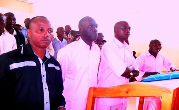 District officials assembled before a local court of law to answer corruption charges and swindling public funds.